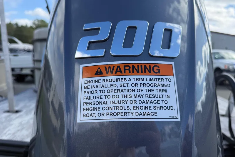 Slide: The Image of 2026 Sylvan X-3 LZ DH engine with warning label about trim limiter installation. - 20