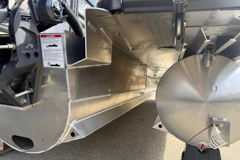 Slide: The Image of 2026 Sylvan X-3 LZ DH pontoon boat underside, showcasing aluminum construction and engineering details. - 21