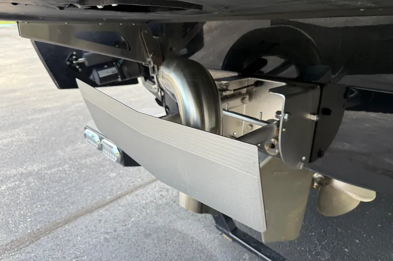 Slide: The Image of 2022 Axis A24 boat underside with propeller and exhaust system. - 25
