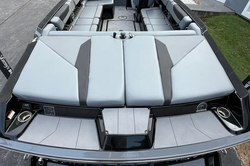 Slide: The Image of 2022 Axis A24 boat interior with spacious seating and modern design. - 7