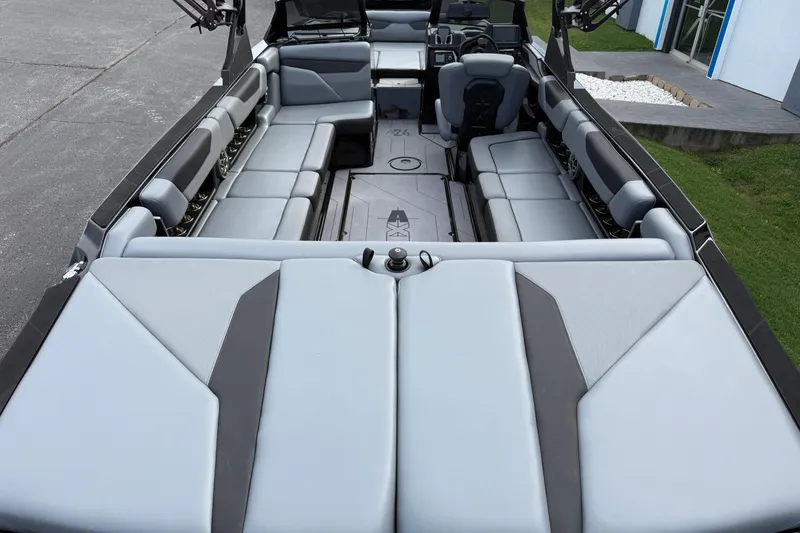 Slide: The Image of 2022 Axis A24 boat interior with spacious seating and modern design. - 8