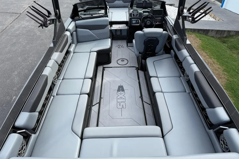 Slide: The Image of 2022 Axis A24 boat interior with spacious seating and modern design. - 9