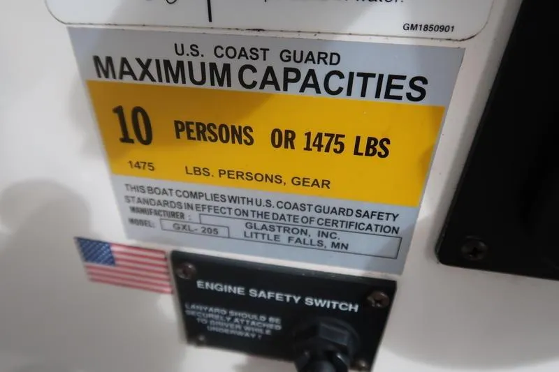Slide: The Image of 2007 Glastron GLX 205 capacity label: 10 persons or 1475 lbs, U.S. Coast Guard compliant. - 11