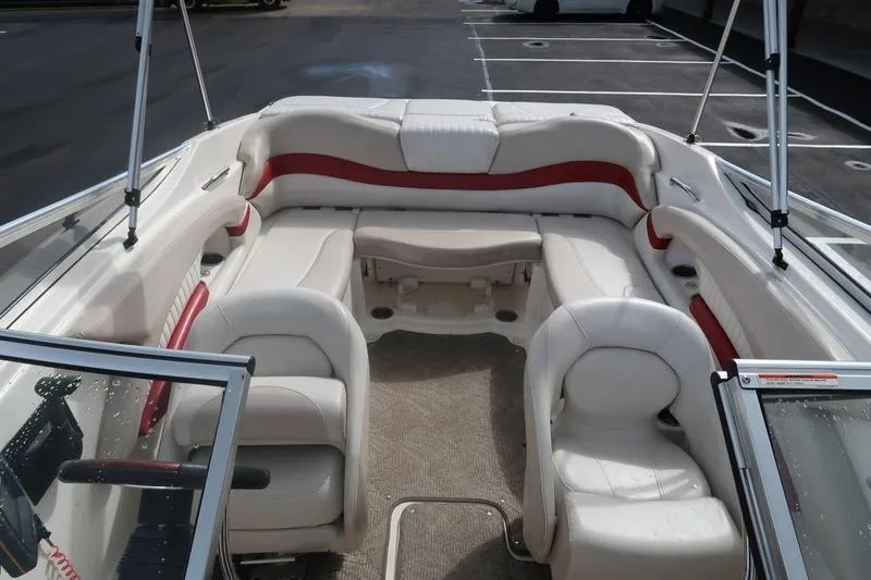 Slide: The Image of 2007 Glastron GLX 205 boat interior with white and red seating. - 16