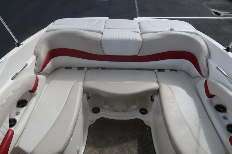 Slide: The Image of 2007 Glastron GLX 205 boat interior with white and red seating arrangement. - 5
