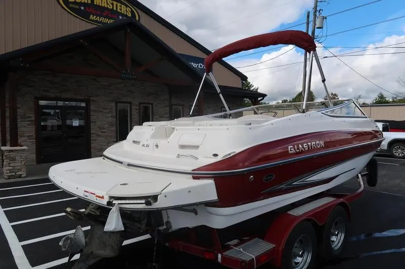 Slide: The Image of 2007 Glastron GLX 205 boat on trailer outside dealership. - 9