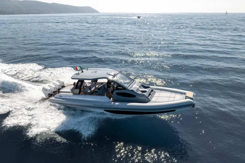 Slide: The Image of 2026 Ranieri CAYMAN 50 HARDTOP cruising on open sea under clear skies. - 3
