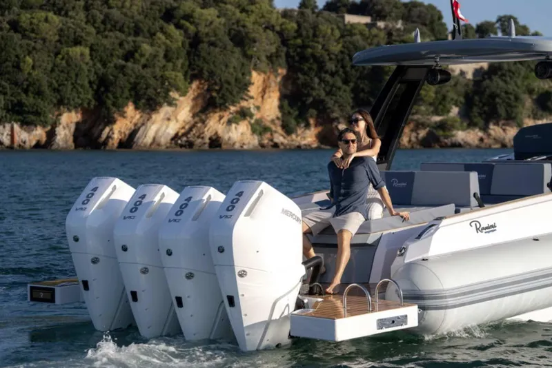 Slide: The Image of Couple enjoying a ride on the 2026 Ranieri CAYMAN 50 HARDTOP yacht. - 33