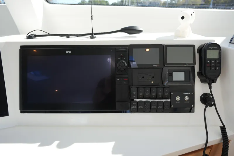 Slide: The Image of 2024 Balance 442 yacht control panel with navigation and communication equipment. - 10