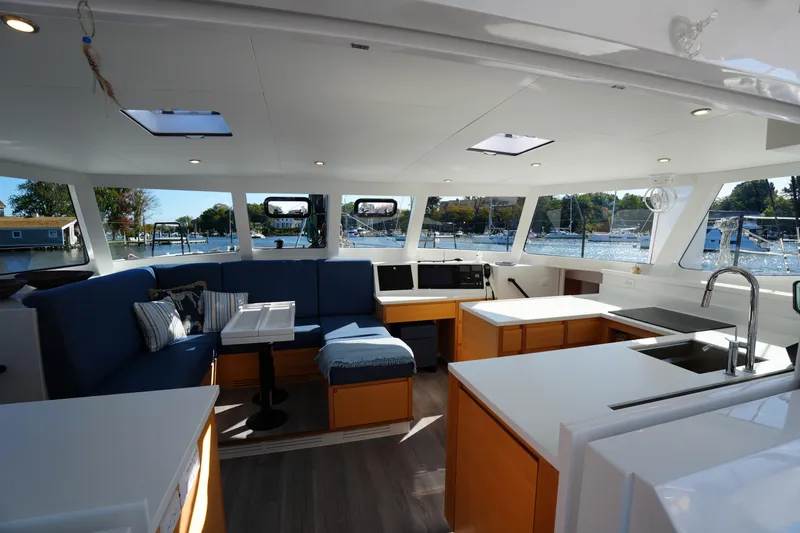 Slide: The Image of Luxurious interior of 2024 Balance 442 yacht with modern kitchen and seating area. - 15