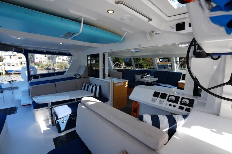 Slide: The Image of Luxurious interior of 2024 Balance 442 catamaran with modern seating and navigation equipment. - 17