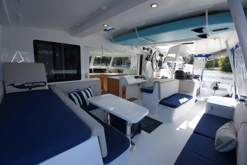 Slide: The Image of Luxurious interior of 2024 Balance 442 catamaran with modern seating and navigation area. - 20