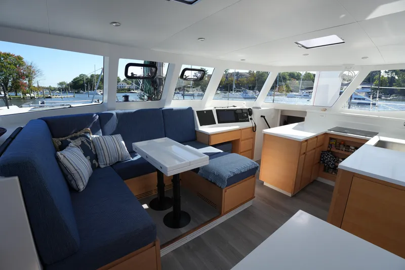Slide: The Image of Luxurious interior of 2024 Balance 442 yacht with modern seating and navigation area. - 3