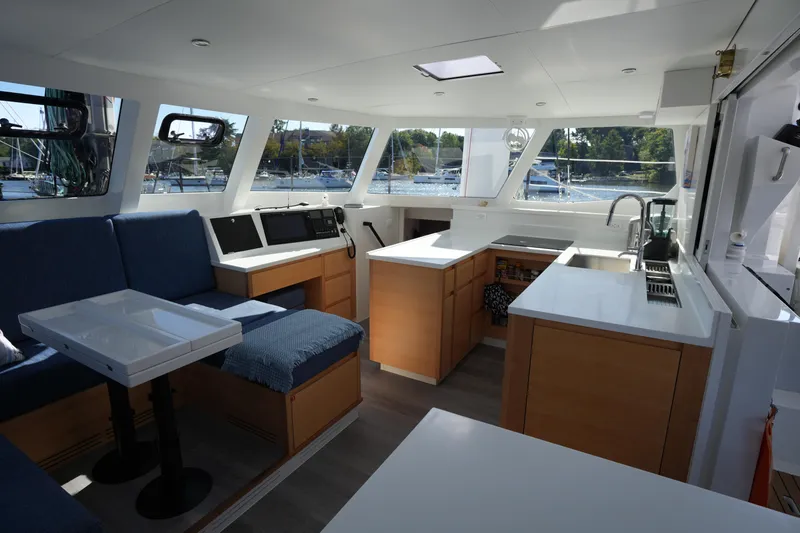 Slide: The Image of Modern interior of 2024 Balance 442 yacht with spacious seating and kitchen area. - 4