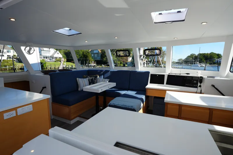 Slide: The Image of Luxurious interior of 2024 Balance 442 yacht with modern seating and scenic views. - 6