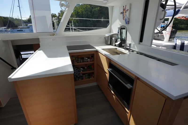 Slide: The Image of Modern kitchen interior on 2024 Balance 442 yacht with sleek countertops and appliances. - 7