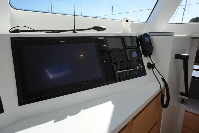 Slide: The Image of Control panel of 2024 Balance 442 yacht with navigation and communication equipment. - 9