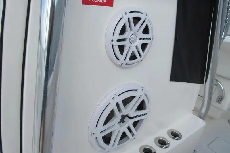 Slide: The Image of 2019 Contender 39 ST boat with JL Audio speakers installed on the console. - 13