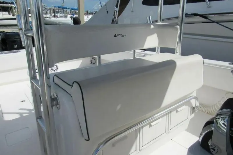 Slide: The Image of 2019 Contender 39 ST boat interior with seating and storage compartments. - 16