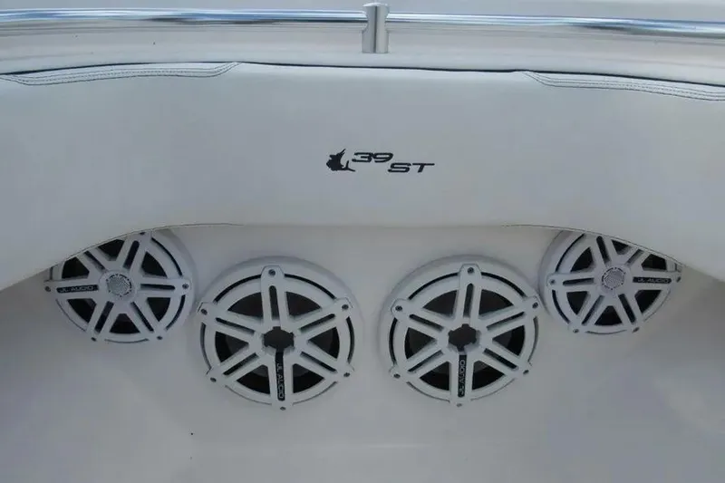 Slide: The Image of 2019 Contender 39 ST boat with four white marine speakers. - 6