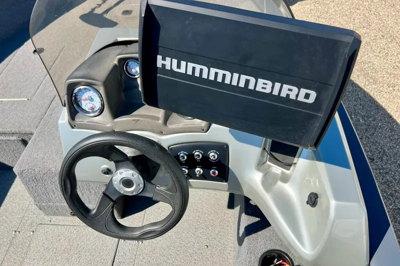 Slide: The Image of 2017 Tracker Pro Guide V-17 SC boat dashboard with Humminbird fish finder. - 14