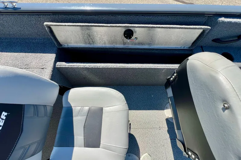 Slide: The Image of 2017 Tracker Pro Guide V-17 SC boat interior with storage compartment and seating. - 20