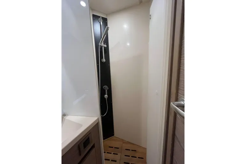 Slide: The Image of Modern shower area in 2021 Hanse 508 yacht, featuring sleek design and fixtures. - 11
