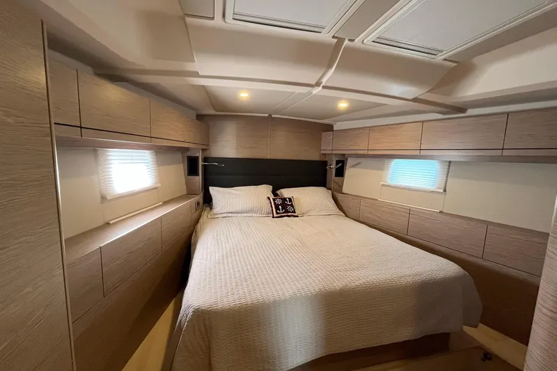 Slide: The Image of Luxurious cabin interior of 2021 Hanse 508 yacht with cozy bed and modern design. - 12
