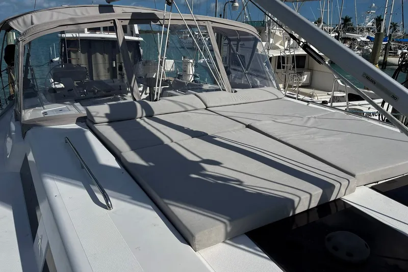 Slide: The Image of 2021 Hanse 508 yacht with sunbathing deck, docked at marina. - 3