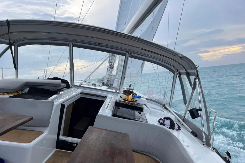 Slide: The Image of Sailing on a 2021 Hanse 508 yacht with ocean view and overcast sky. - 9