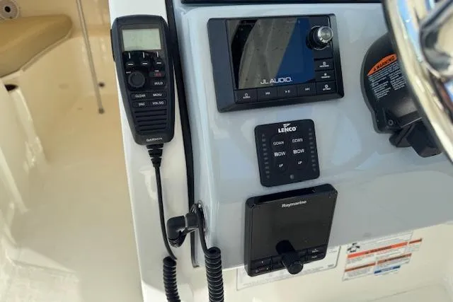 Slide: The Image of Control panel of 2021 Pursuit DC 266 Dual Console with audio and navigation systems. - 11