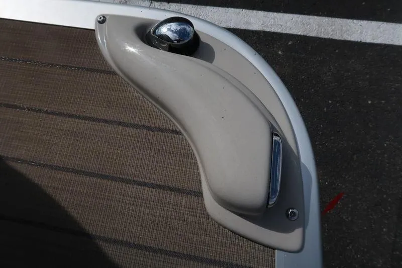Slide: The Image of Bennington 21 SL 2020 boat detail with chrome fixture on deck. - 13