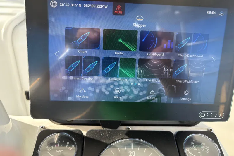 Slide: The Image of Touchscreen navigation display on a 1995 Luhrs Open Express boat, showing various marine applications. - 29