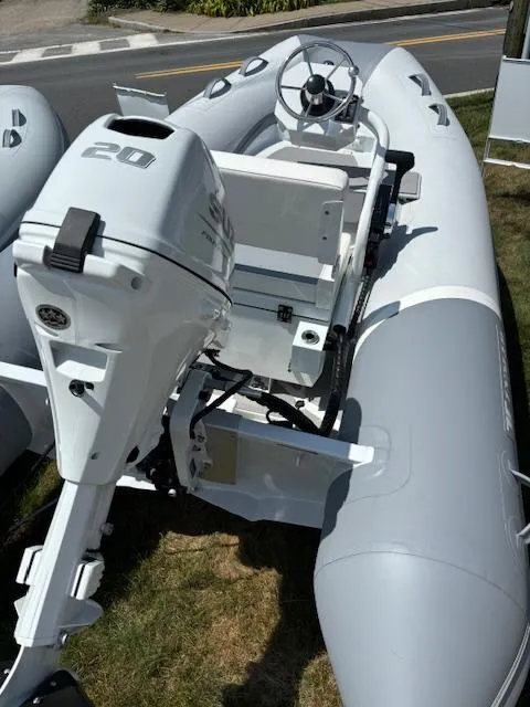Slide: The Image of 2024 Inmar 325R-AL inflatable boat with 20HP outboard motor. - 3