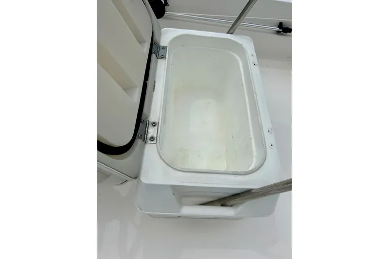 Slide: The Image of White seat on 1997 Wellcraft 160 Fisherman boat, featuring sturdy metal frame. - 12