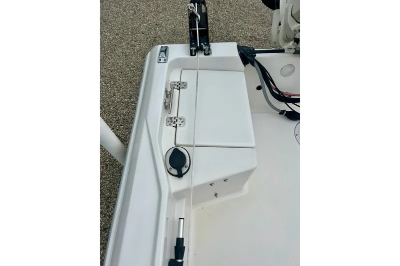 Slide: The Image of 1997 Wellcraft 160 Fisherman boat interior with white seating and steering wheel. - 26