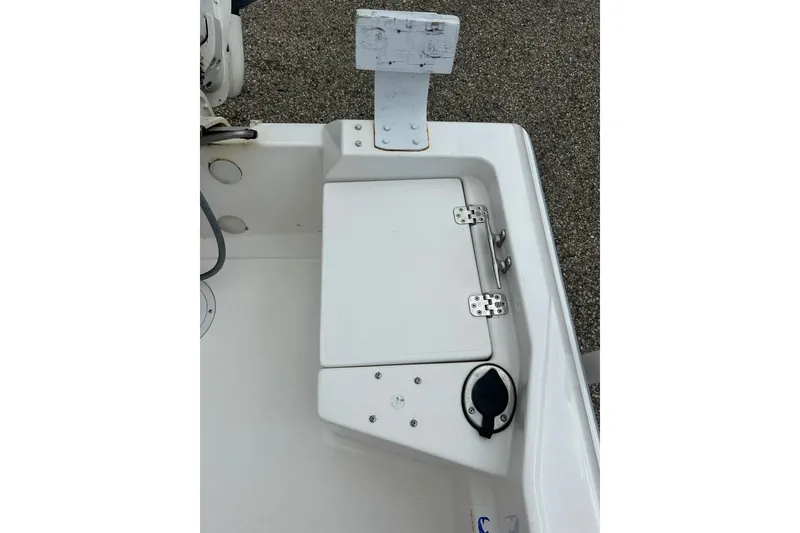 Slide: The Image of Battery compartment of a 1997 Wellcraft 160 Fisherman boat, featuring a Northern marine battery. - 28