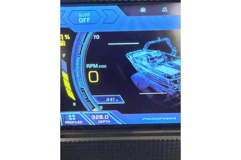 Slide: The Image of Dashboard display of a 2021 Moomba Max boat showing RPM and depth settings. - 18