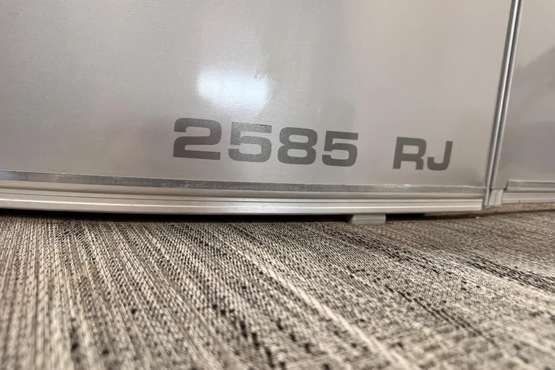 Slide: The Image of 2023 Avalon Catalina Platinum boat, model 2585 RJ, close-up view. - 11