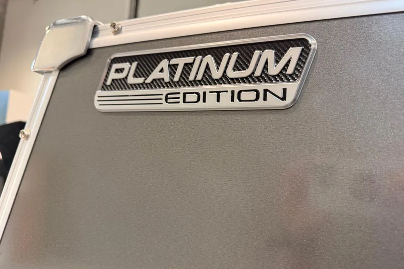 Slide: The Image of 2023 Avalon Catalina Platinum Edition badge on sleek metallic surface. - 15