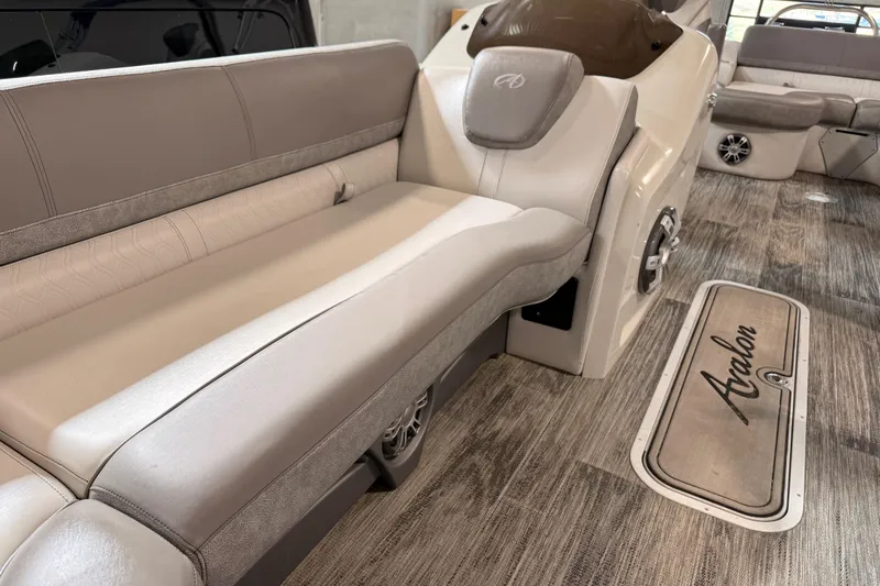 Slide: The Image of 2023 Avalon Catalina Platinum Rear J Lounge interior with luxurious seating and stylish flooring. - 7
