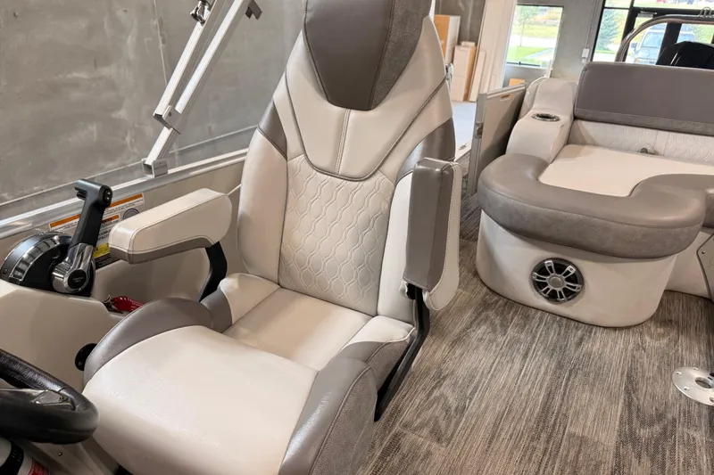 Slide: The Image of 2023 Avalon Catalina Platinum boat interior with luxurious seating and modern design. - 9