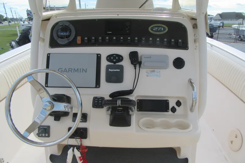 Slide: The Image of 2012 Grady-White Canyon 271 boat console with Garmin and Raymarine electronics. - 37