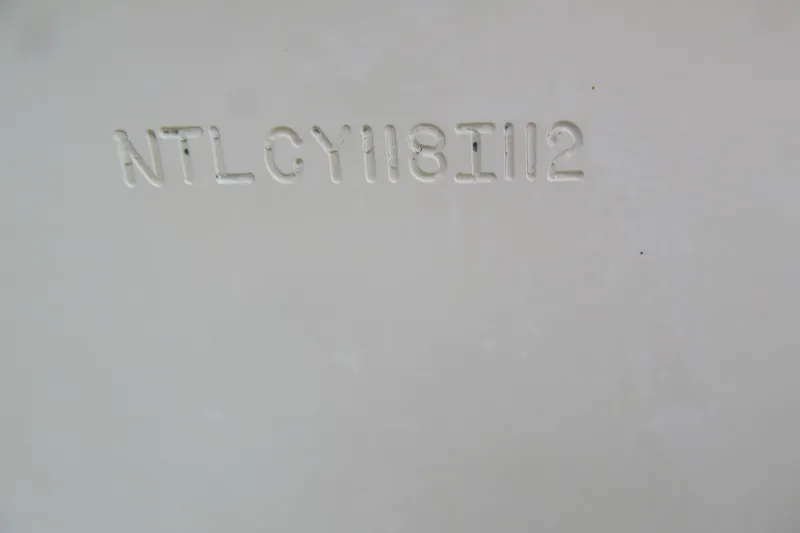 Slide: The Image of Hull identification number on 2012 Grady-White Canyon 271 boat. - 5