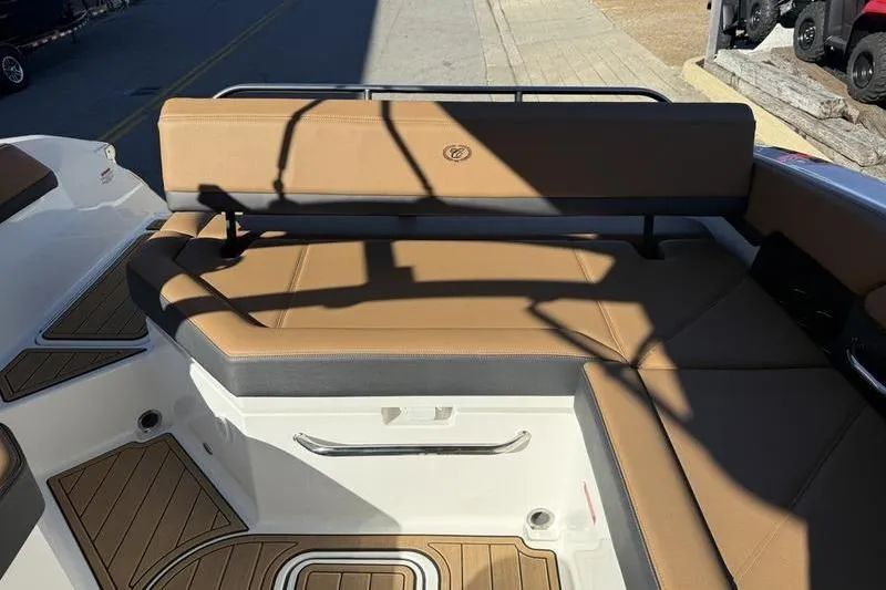 Slide: The Image of 2022 Cobalt R6 boat interior with tan seating and sleek design. - 15