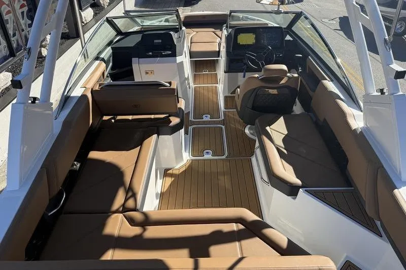 Slide: The Image of 2022 Cobalt R6 boat interior with tan seating and sleek design. - 30