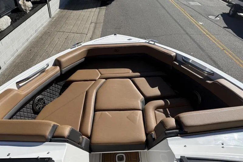 Slide: The Image of 2022 Cobalt R6 boat with tan seating and modern design. - 7