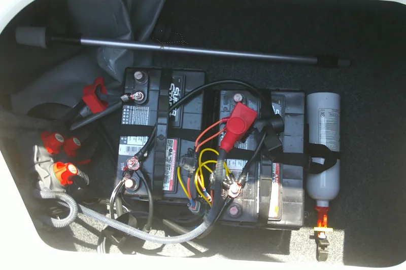 Slide: The Image of Battery compartment of 2010 Yamaha Boats 242 Limited S with fire extinguisher. - 20