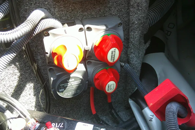 Slide: The Image of Battery switches and wiring in a 2010 Yamaha Boats 242 Limited S. - 21