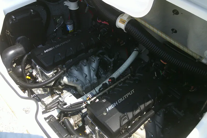 Slide: The Image of Engine compartment of 2010 Yamaha Boats 242 Limited S, featuring high output engines. - 22